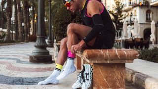 Compressport Mid Compression Socks V2.0 pink and yellow