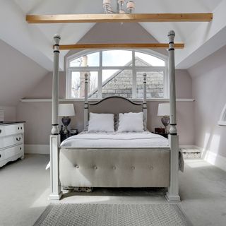 master bedroom with grey wall and carpet on the floor