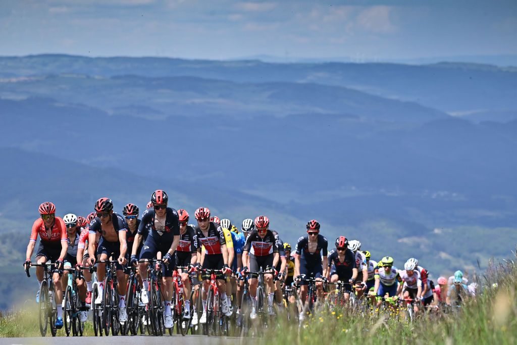The Criterium du Dauphine peloton climb during stage 2
