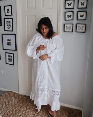 Influencer wore a white broderie anglaise dress