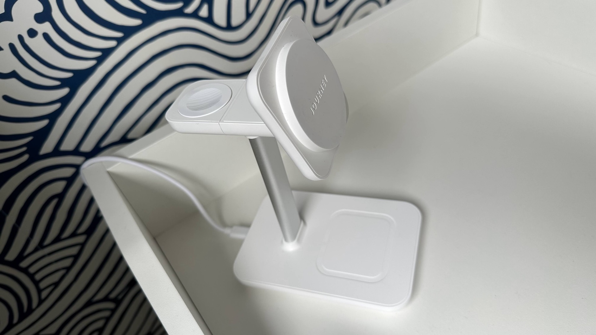 The Journey Rapid Trio 3-in-1 Wireless Charging Station on a bedside table