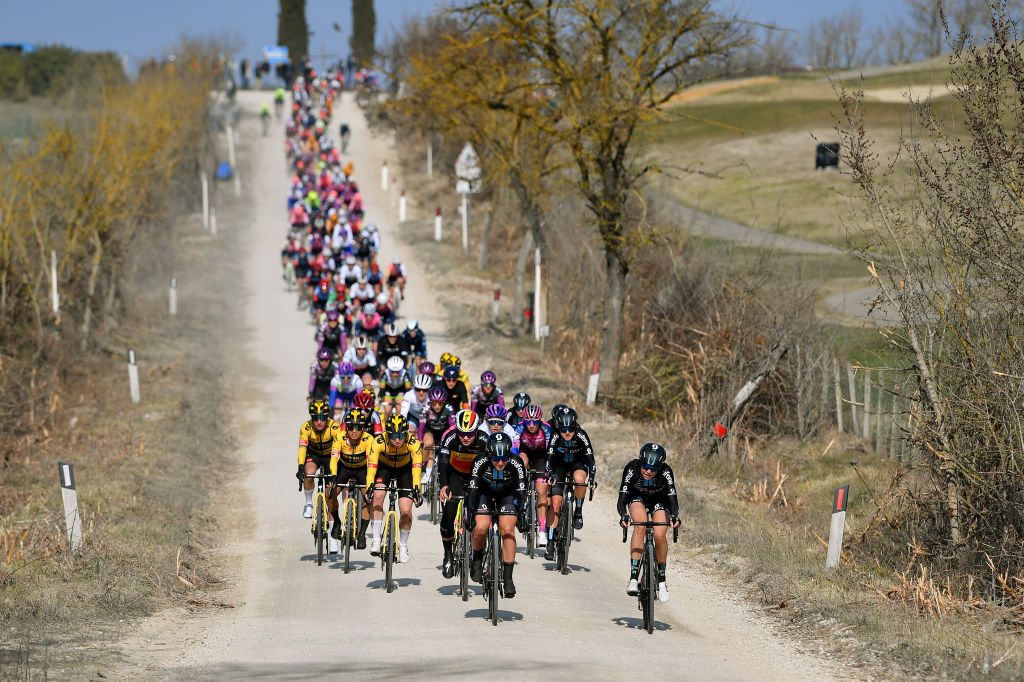 SIENA ITALY MARCH 05 A general view of Marianne Vos of Netherlands Coryn LabeckiRivera of United States and Team Jumbo Visma Lotte Kopecky of Belgium and Team SD Worx Jessica Allen of Australia and Team Bikeexchange Jayco Franziska Koch of Germany and Team DSM and the peloton compete through gravel roads during the Eroica 8th Strade Bianche 2022 Womens Elite a 136km one day race from Siena to Siena Piazza del Campo 321m StradeBianche on March 05 2022 in Siena Italy Photo by Luc ClaessenGetty Images