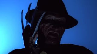 Freddy Krueger taunts a teenage girl in her neighborhood in A Nightmare on Elm Street