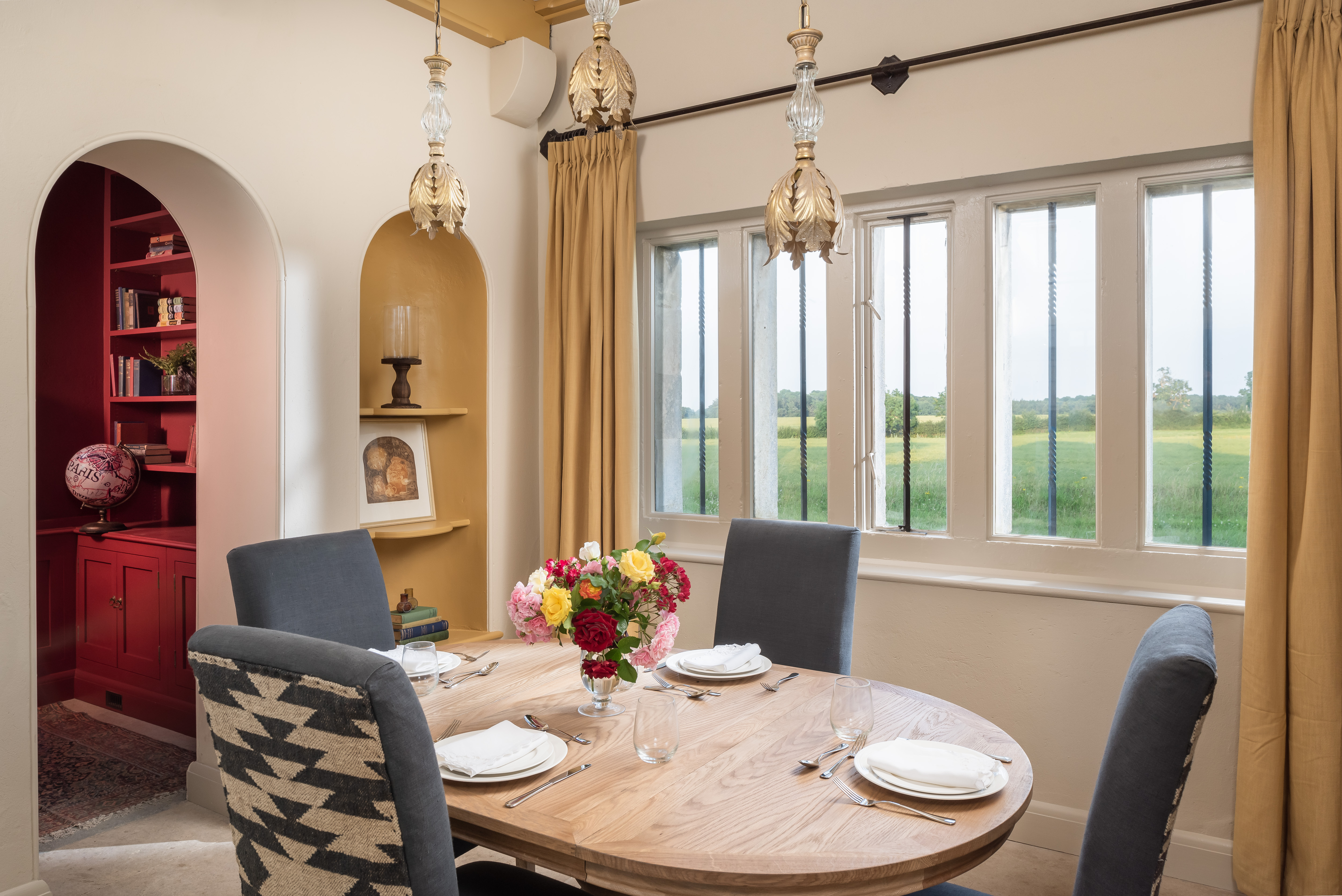 Dining room with yellow alcoves