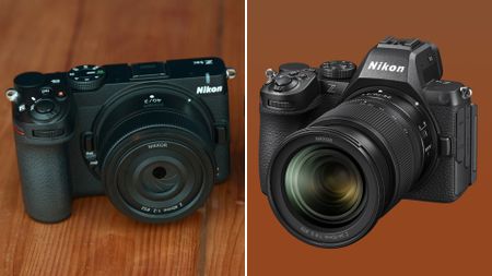 Nikon Z5IIC and Nikon Z5II next to each other on a brown background 