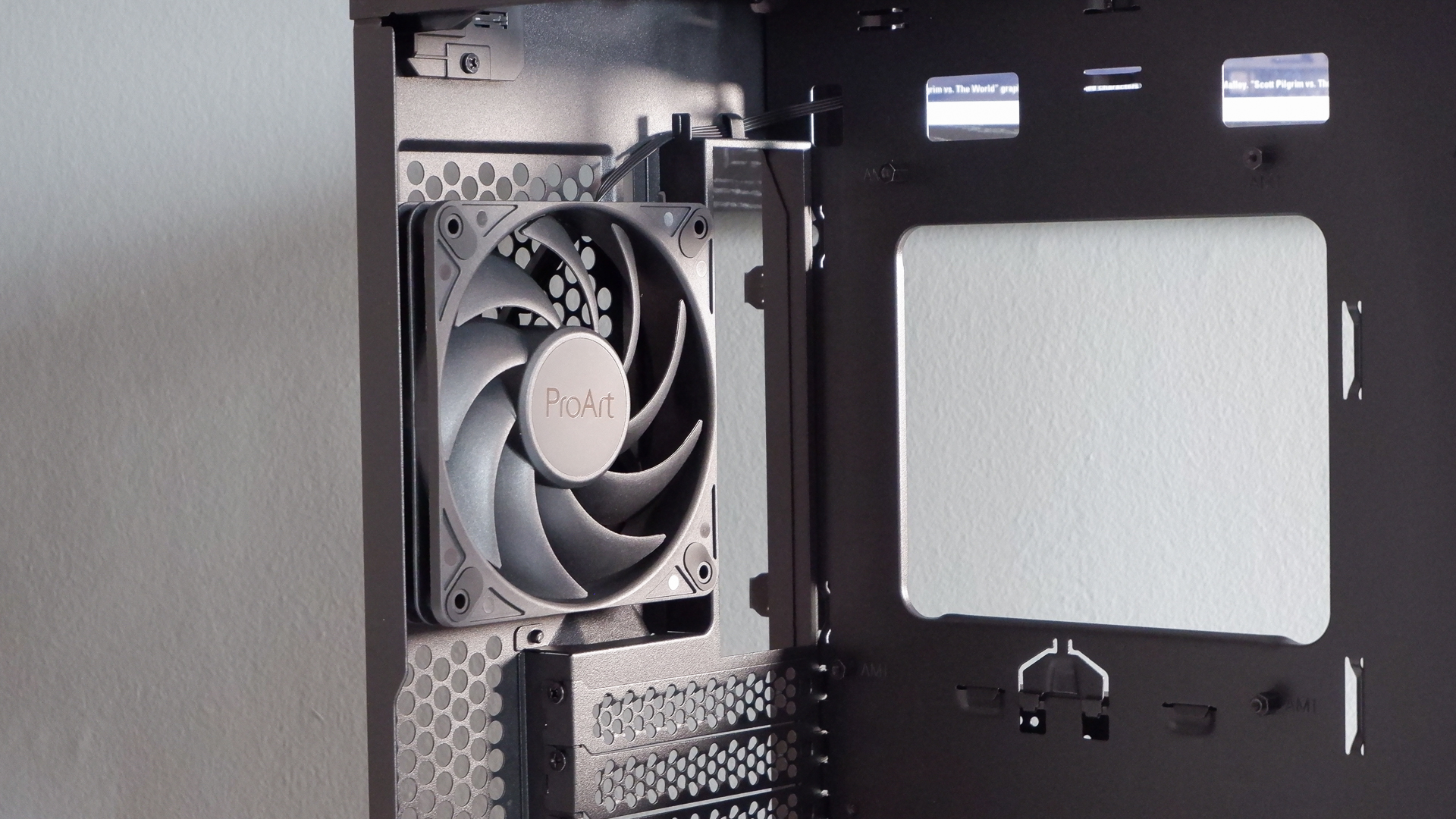 A gaming PC in the process of being built, using Radeon and Ryzen components and an Asus Pro Art PA401 PC case.
