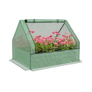 Raised garden bed with small greenhouse cover