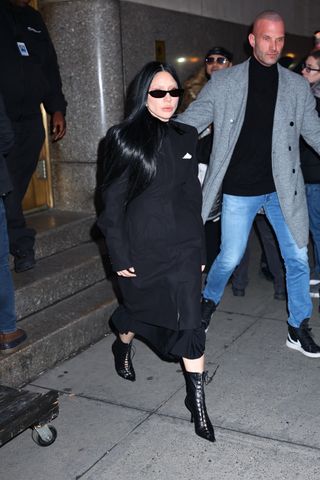 Lady Gaga wears head-to-toe black including Jimmy Choo boots