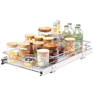 A pull-out shelving unit with wie barriers, filled with glass storage jars with bamboo lids