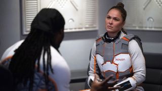 Ronda Rousey talking to someone in Stars on Mars