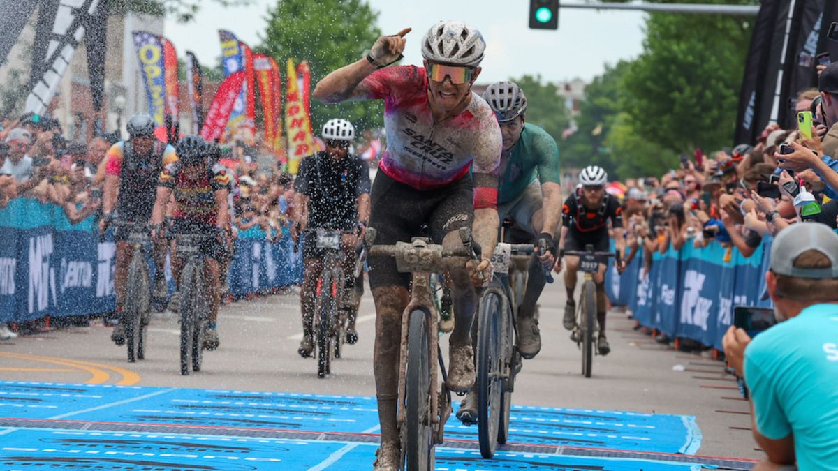 Keegan Swenson the Unbound Gravel 200 winner crossing the line