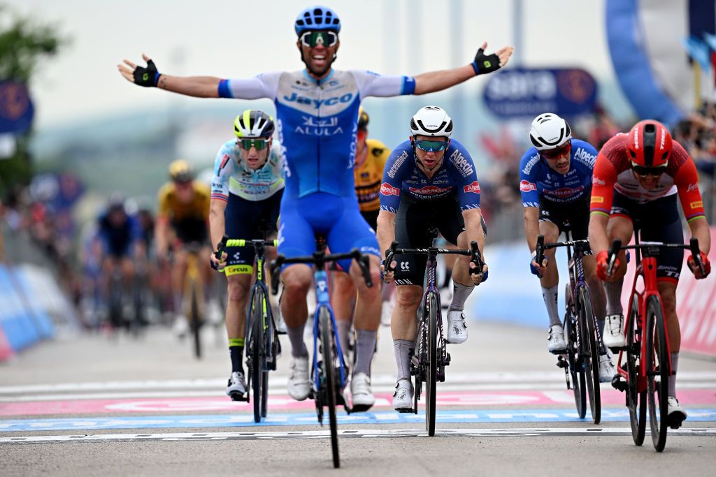 MELFI ITALY MAY 08 Kaden Groves of Australia and Team AlpecinDeceuninck crosses the finish line during the 106th Giro dItalia 2023 Stage 3 a 213km stage from Vasto to Melfi 532m UCIWT on May 08 2023 in Melfi Italy Photo by Stuart FranklinGetty Images