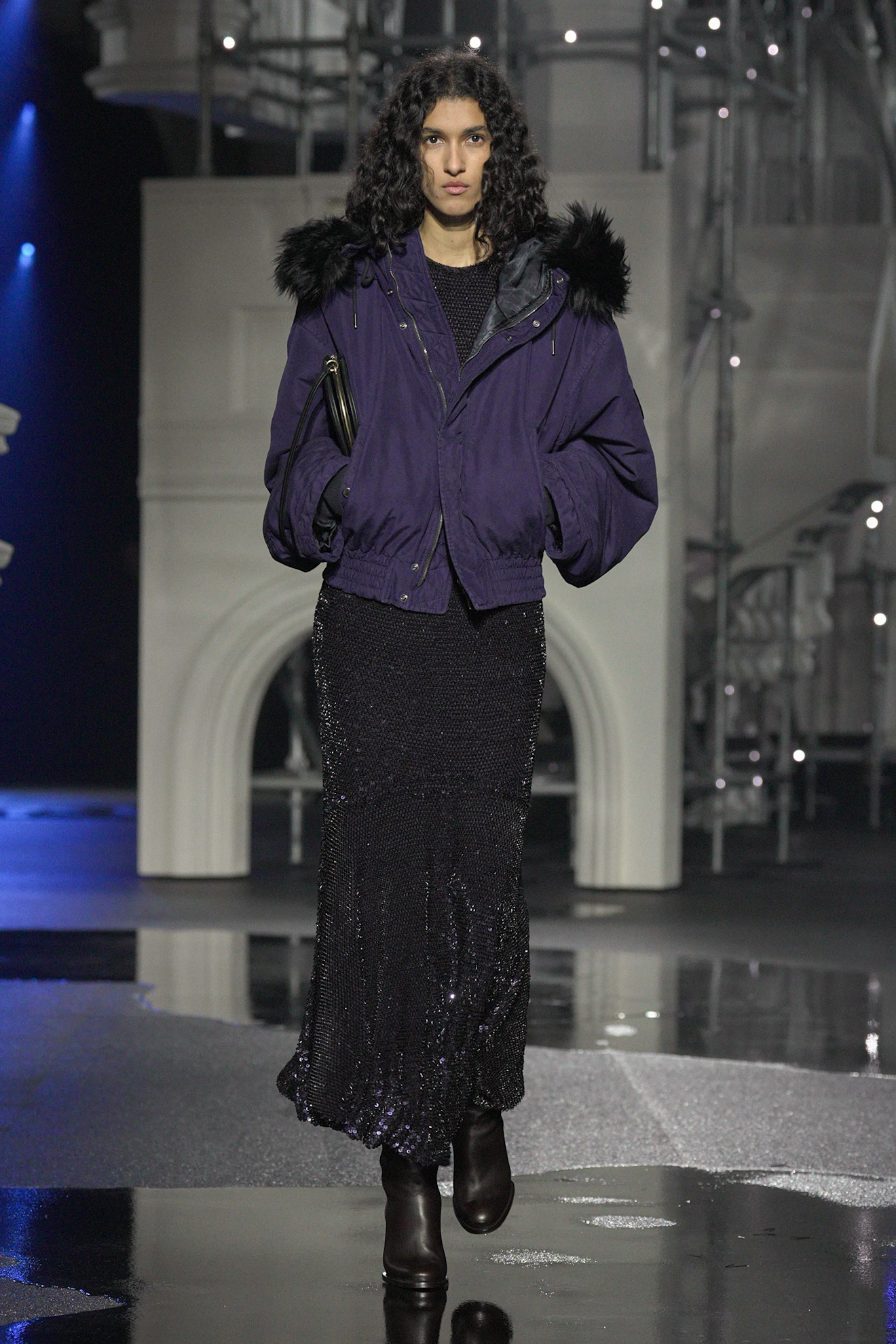 a burberry model wears plum purple.