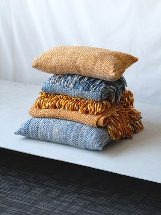 cushions and folded throws