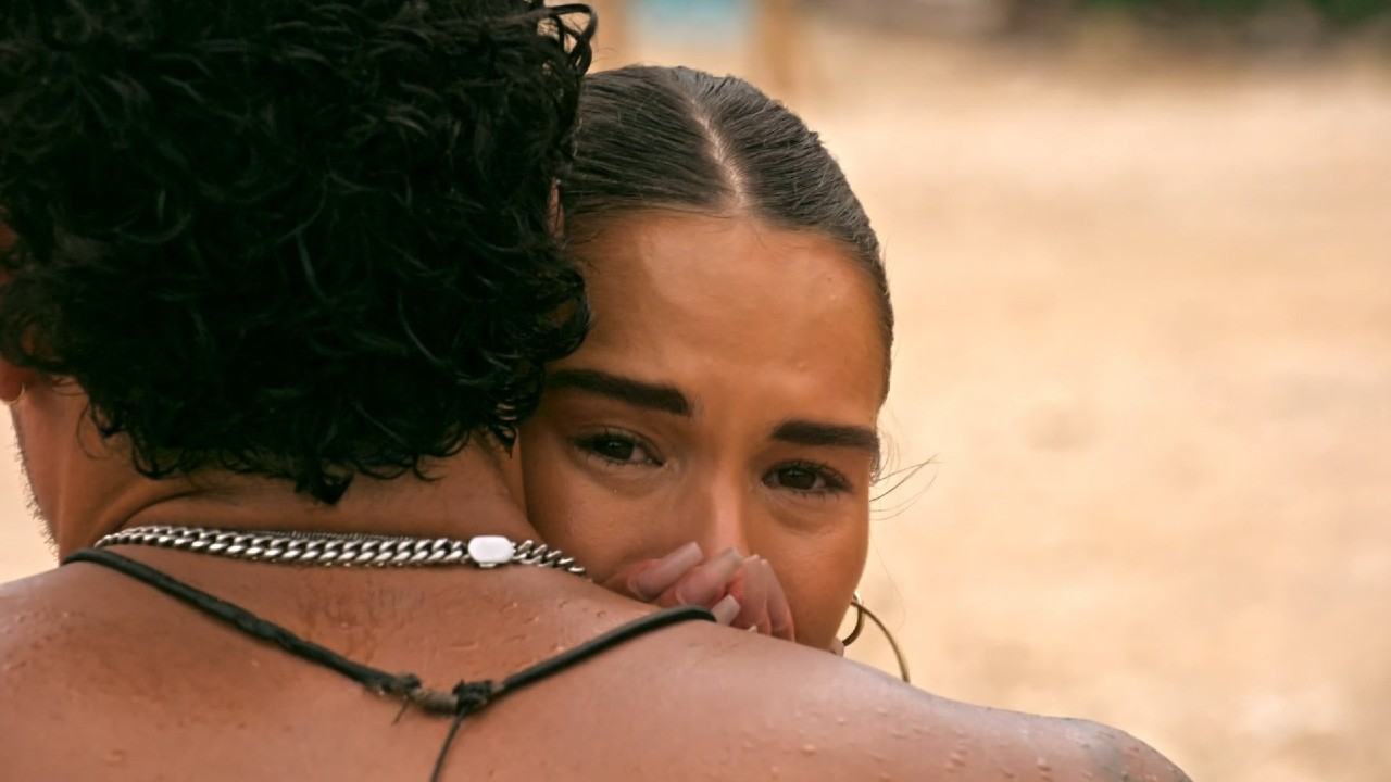 Lucy crying while hugging Daniel in Perfect Match.