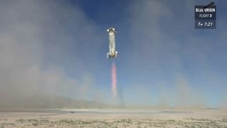 Blue Origin's suborbital New Shepard rocket lands safely on its West Texas pad after a successful in-flight crew capsule abort test on Oct. 5, 2016.