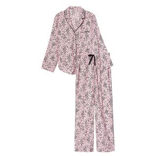 flat lay of victorias secret pink flannel pajamas with black mini hearts pattern