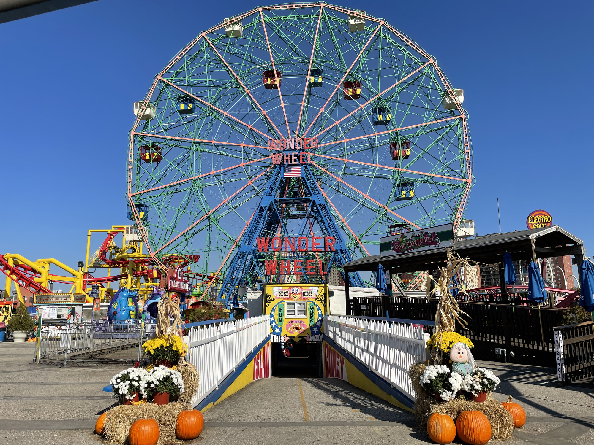 A centered shot of the famous Wonder Wheel (ferris wheel) in Luna Park. One of the main attractions of the amusement park in Coney Island, Brooklyn, NY.