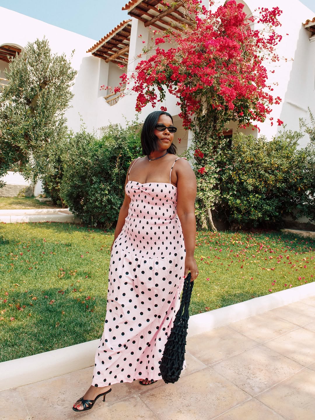 Karina wearing polka dot dress