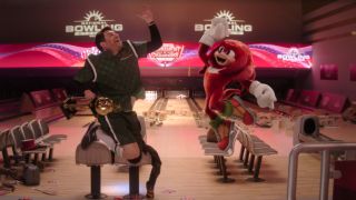 Wade Whipple (Adam Pally) jumping to give Knuckles a high five on Knuckles