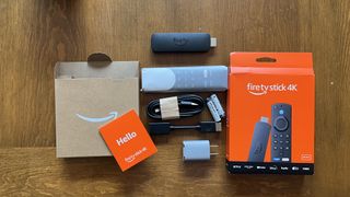 Amazon Fire TV Stick 4K (2023) and accessories on table