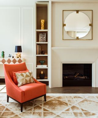 seating area detail with red chair at No.1 Grosvenor Square - Living Room Fireplace