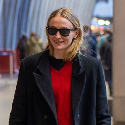 Sophie Turner arriving at the airport with her boyfriend