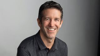 Photo of John Ternus from the shoulders up