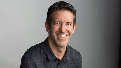 Photo of John Ternus from the shoulders up