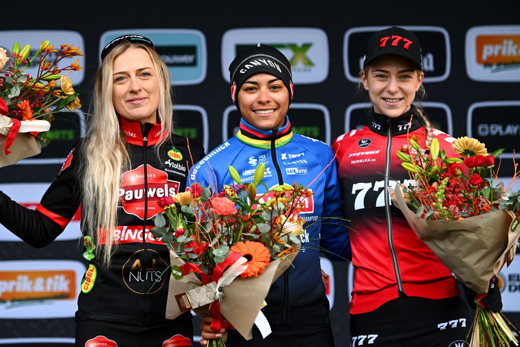 RIJKEVORSEL BELGIUM NOVEMBER 19 LR Denise Betsema of The Netherlands and Team Pauwel Sauzen Bingoal on second place race winner Ceylin Del Carmen Alvarado of The Netherlands and Team Alpecin Deceuninck and Inge Van Der Heijden of The Netherlands and Team 777 on third place pose on the podium ceremony after the 36th Superprestige Merksplas 2022 Womens Elite Superprestige2023 CXWorldCup CycloCross on November 19 2022 in Rijkevorsel Belgium Photo by Luc ClaessenGetty Images