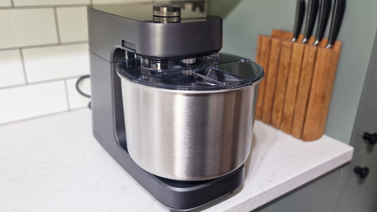 The Ooni Halo Pro Spiral mixer being tested in a green and white kitchen