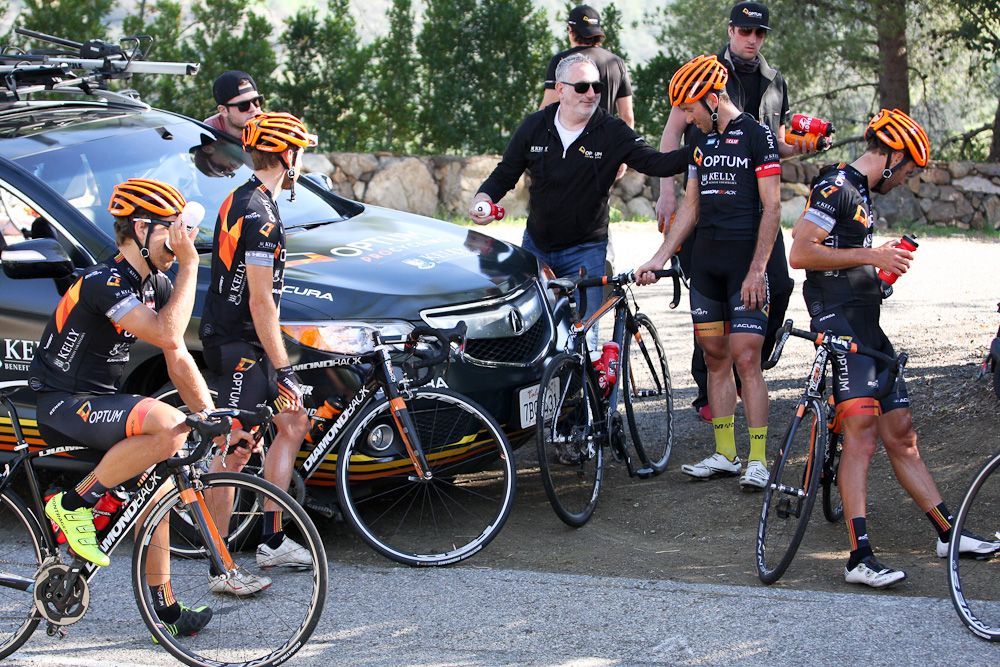 Optum Pro Cycling team owner Charles Aaron congratulates "camp champ" Ryan Anderson.
