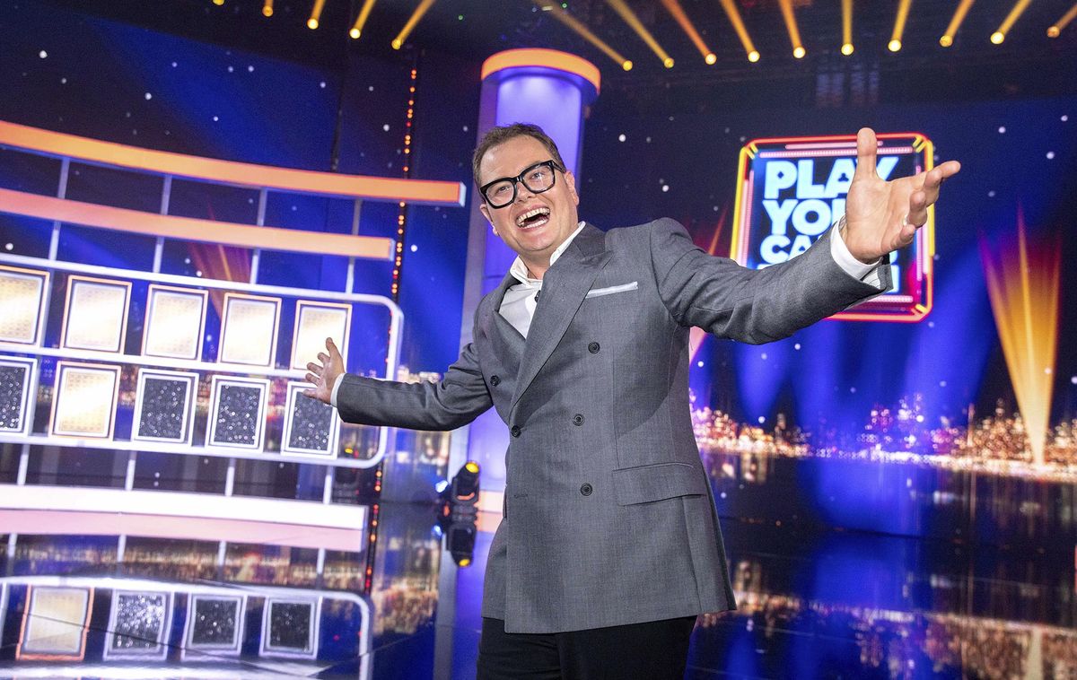 Alan Carr hosting Play Your Cards Right for his Epic Gameshow.