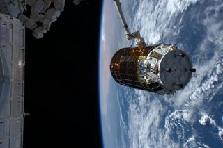 The Japanese cargo ship HTV-5 arrived at the International Space Station on Aug. 24, 2015. Astronaut Kimiya Yui of Japan posted this photo of the spacecraft after capturing it by robotic arm. 