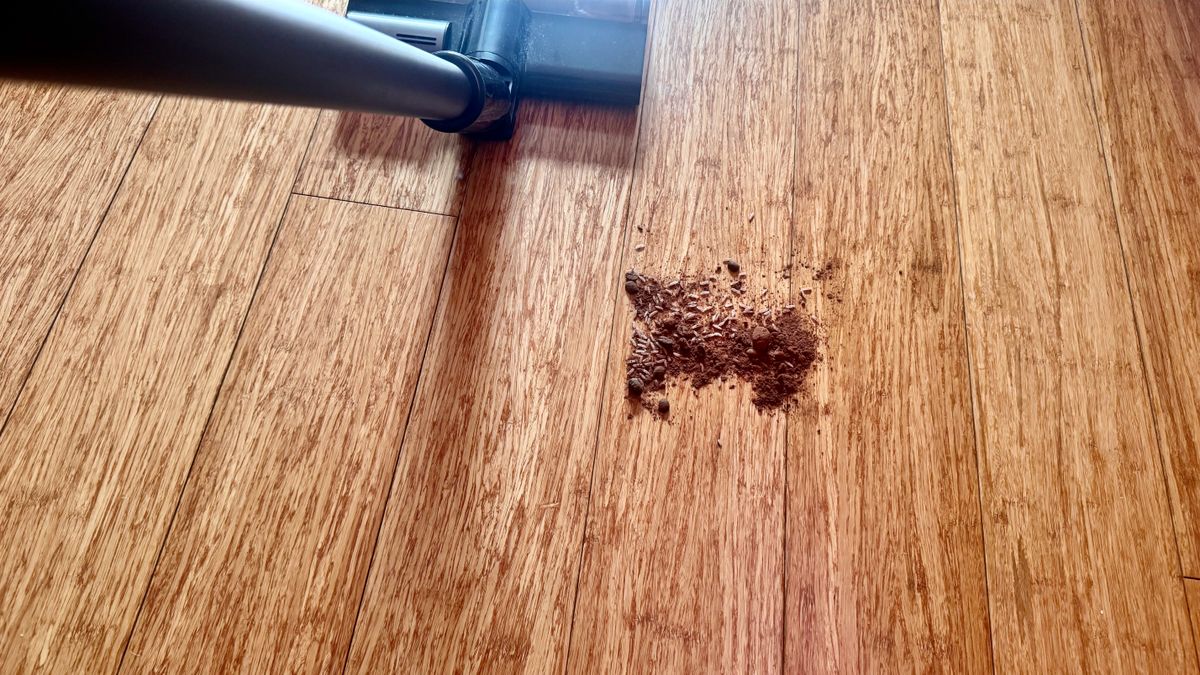 Debris spill being cleaned from a hard floor