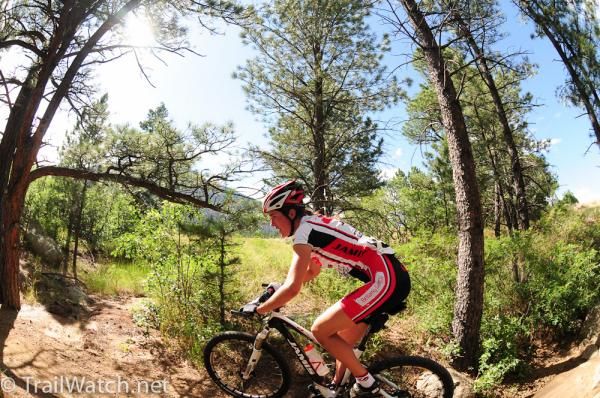 A Jamis rider enjoys some twisty downhill singletrack