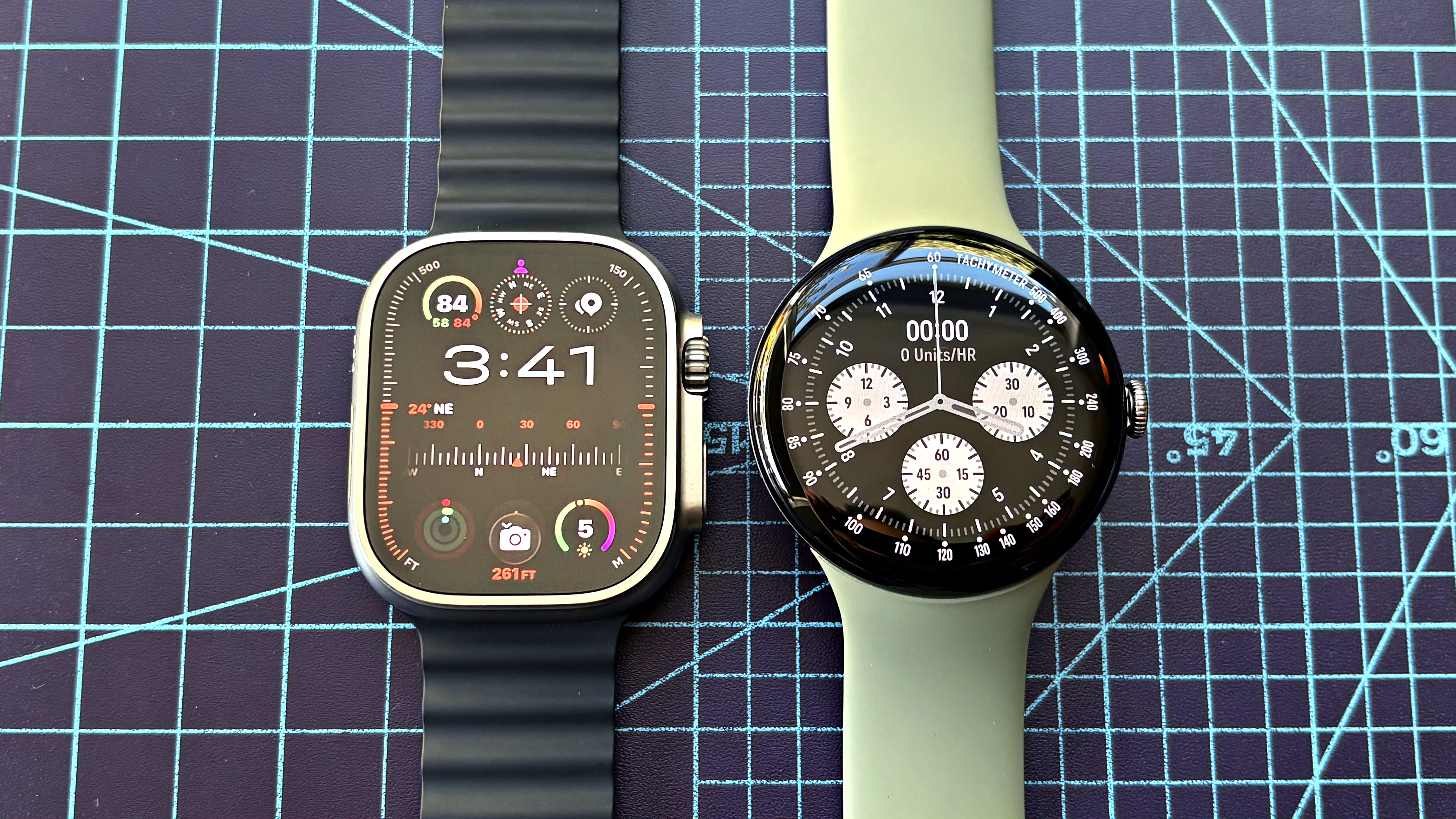 Close-up of the Apple Watch Ultra 3 next to the new Google Pixel Watch 5