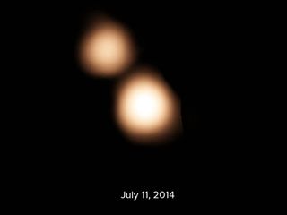 Pluto and Charon on July 11, 2014