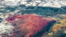 Aerial view of Lake Natron with its red water.