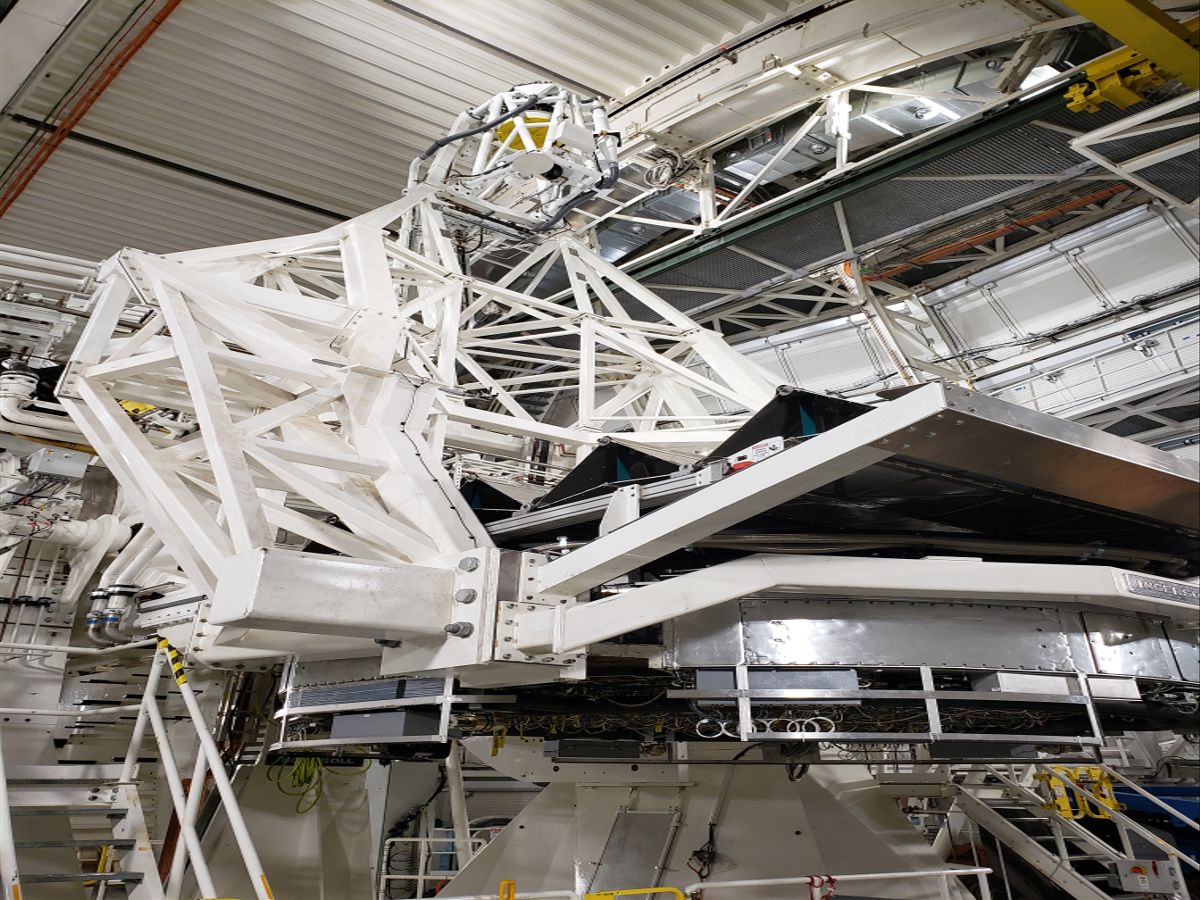 The rotating track on the floor allows the telescope to turn as the sun moves across the sky.
