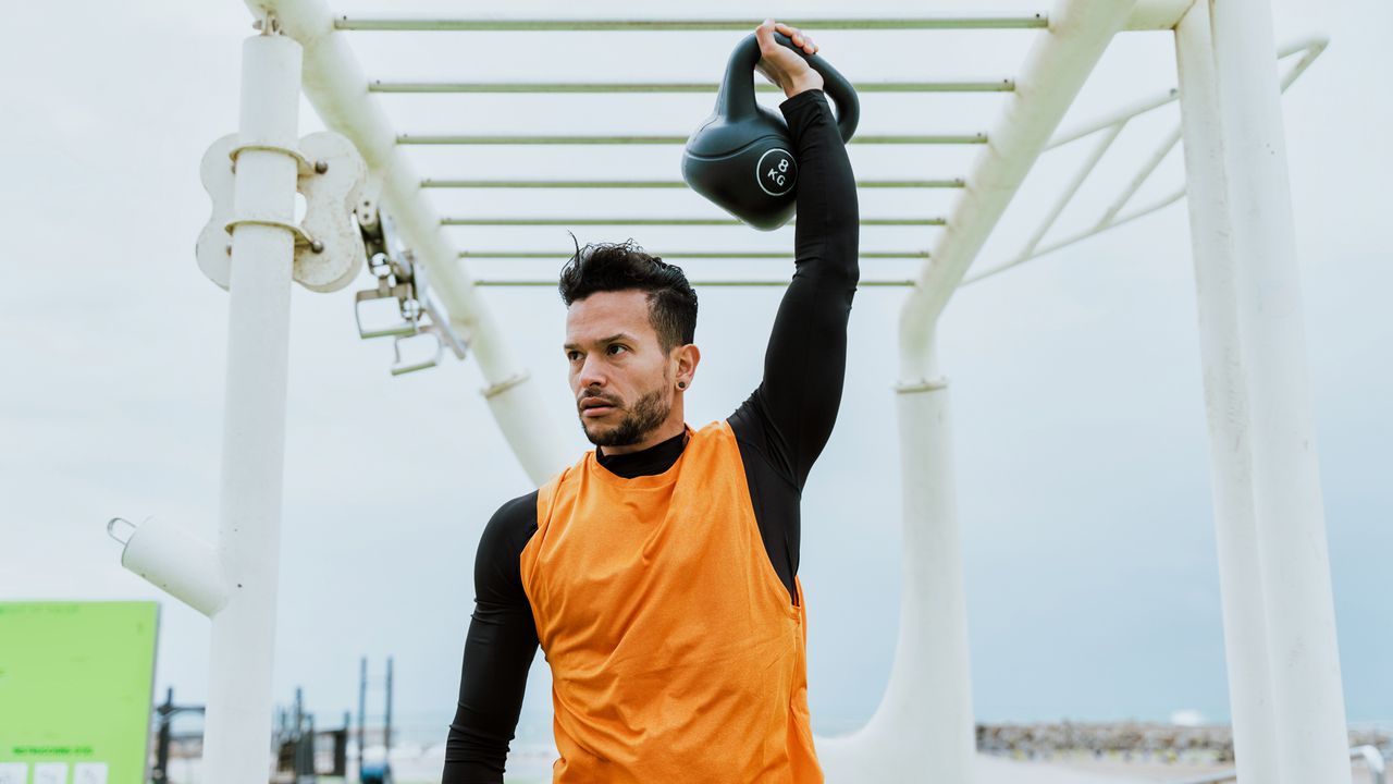 Man lifting a kettlebell