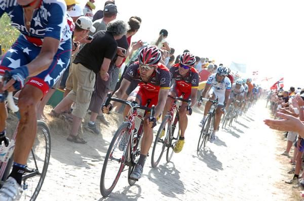 RadioShack teammates Levi Leipheimer and Chris Horner follow the wheel of cobbles veteran George Hincapie (BMC Racing).