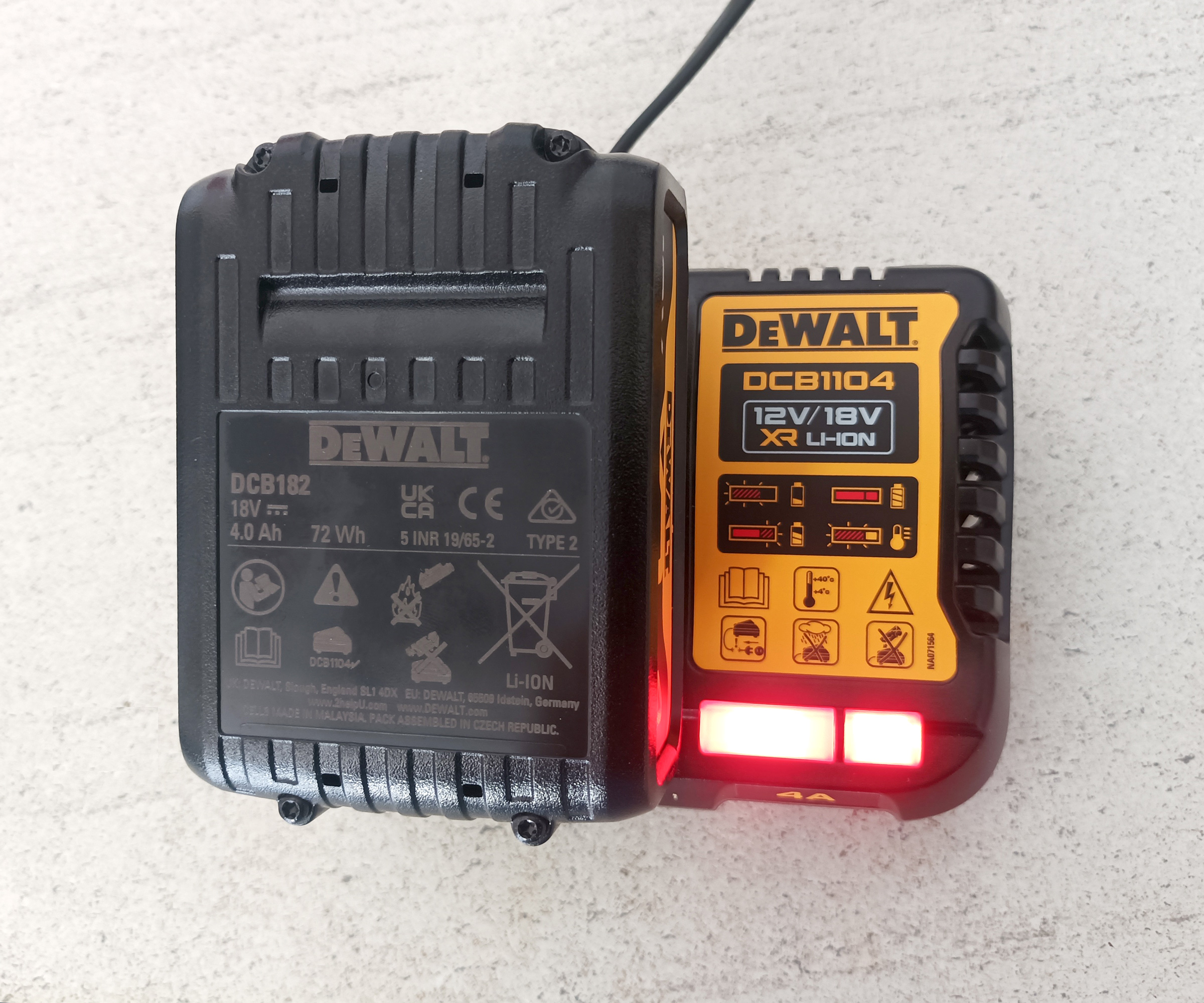 Close up of battery in charger for DeWalt DCS331N Cordless Jigsaw