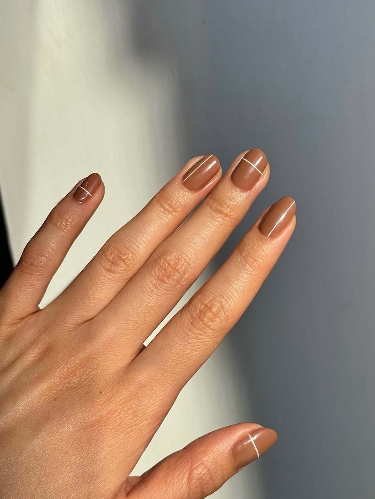 A minimalist gingerbread manicure