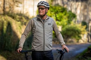 Gorewear Everyday Windstopper Vest in Beige and a male cyclist