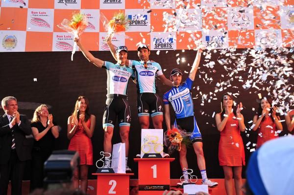 Francesco Chicchi (Omega Pharma-Quick Step) flanked by his teammate Tom Boonen and Jake Keough (UnitedHealthcare Professional Cycling Team).
