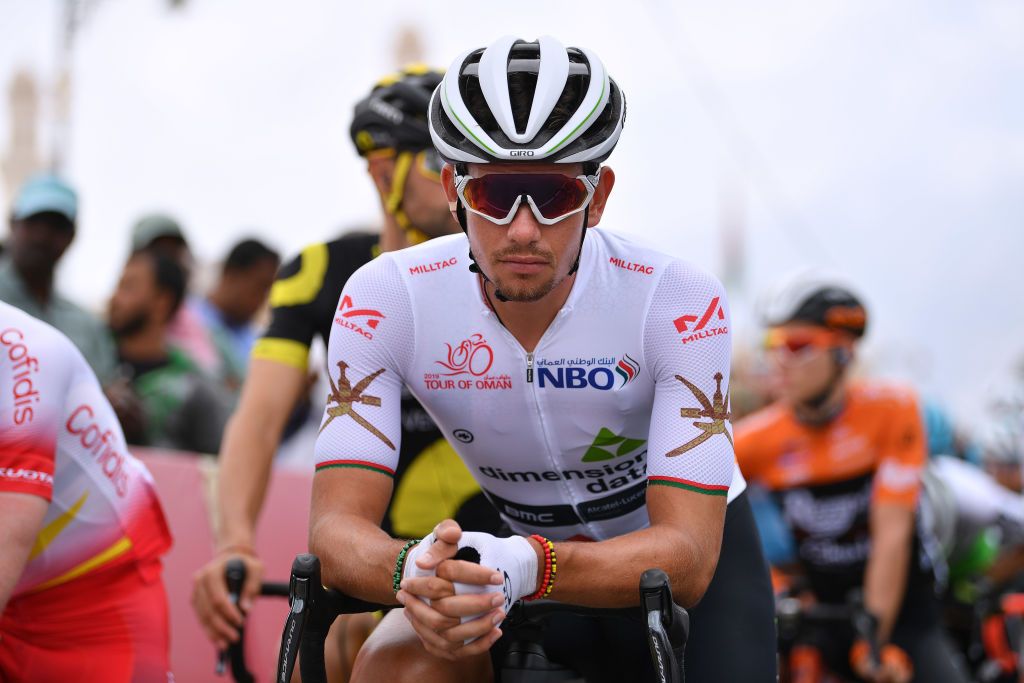 Ryan Gibbons wears the jersey of best young rider