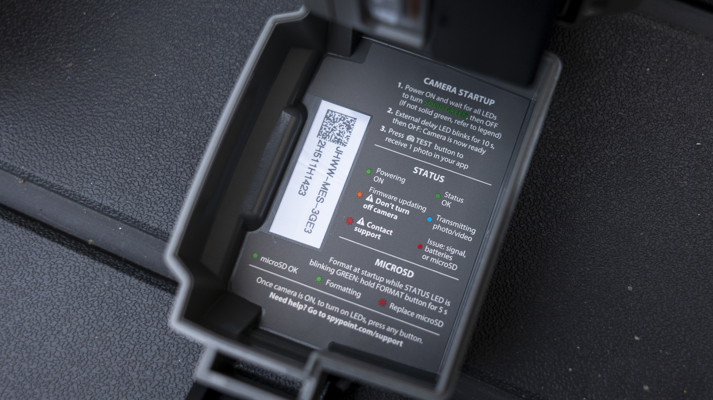 The Spypoint FLEX-S-Dark trail camera instructions underneath