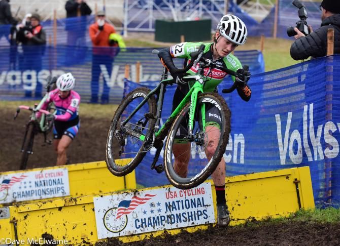 Elle Anderson running the barriers ahead of Courtenay McFadden