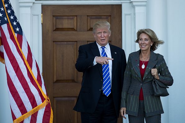 Donald Trump and Betsy DeVos.